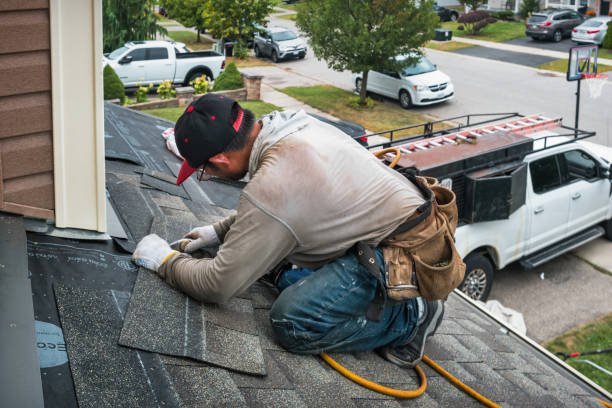 Professional Roof Replacement technician working in Keuka Park, NY